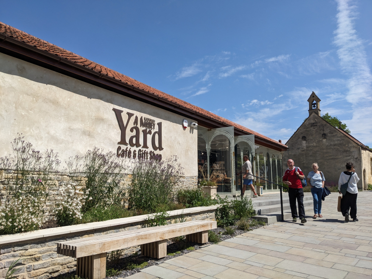 An external view of the Yard showing St Patrick's Chapel and the Yard Cafe and Gift Shop building